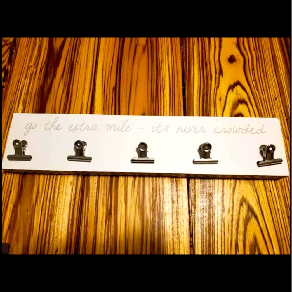 “Go the extra mile” photo holder